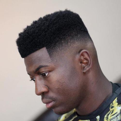 foto de homem negro com corte de cabelo box fade