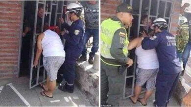 Mulher tenta espiar a casa dos vizinhos e fica presa nas grades durante 5 horas