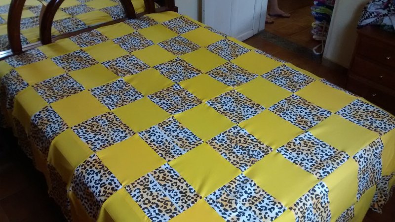 colcha com retalhos de onça